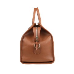 The Cognac Tumbled Leather Signature Duffle by Frank Clegg, displayed front-facing, features top zippers and handles. This elegant brown bag exemplifies luxury travel style for discerning travelers, set against a gray background.