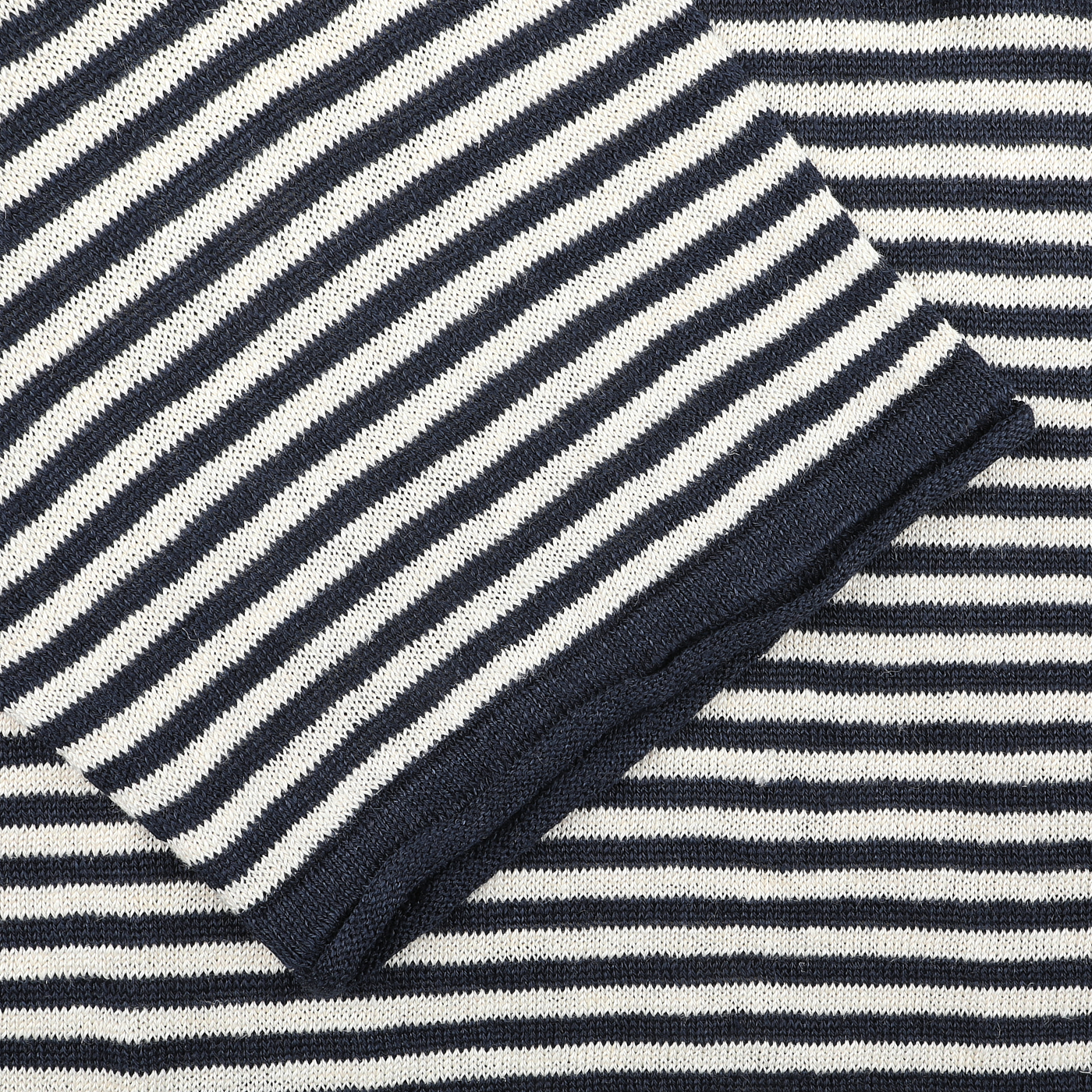 Close-up of G.R.P's Blue Ecru Striped Linen Henley T-Shirt, showcasing its slim fit with horizontal stripes and neatly folded edges.