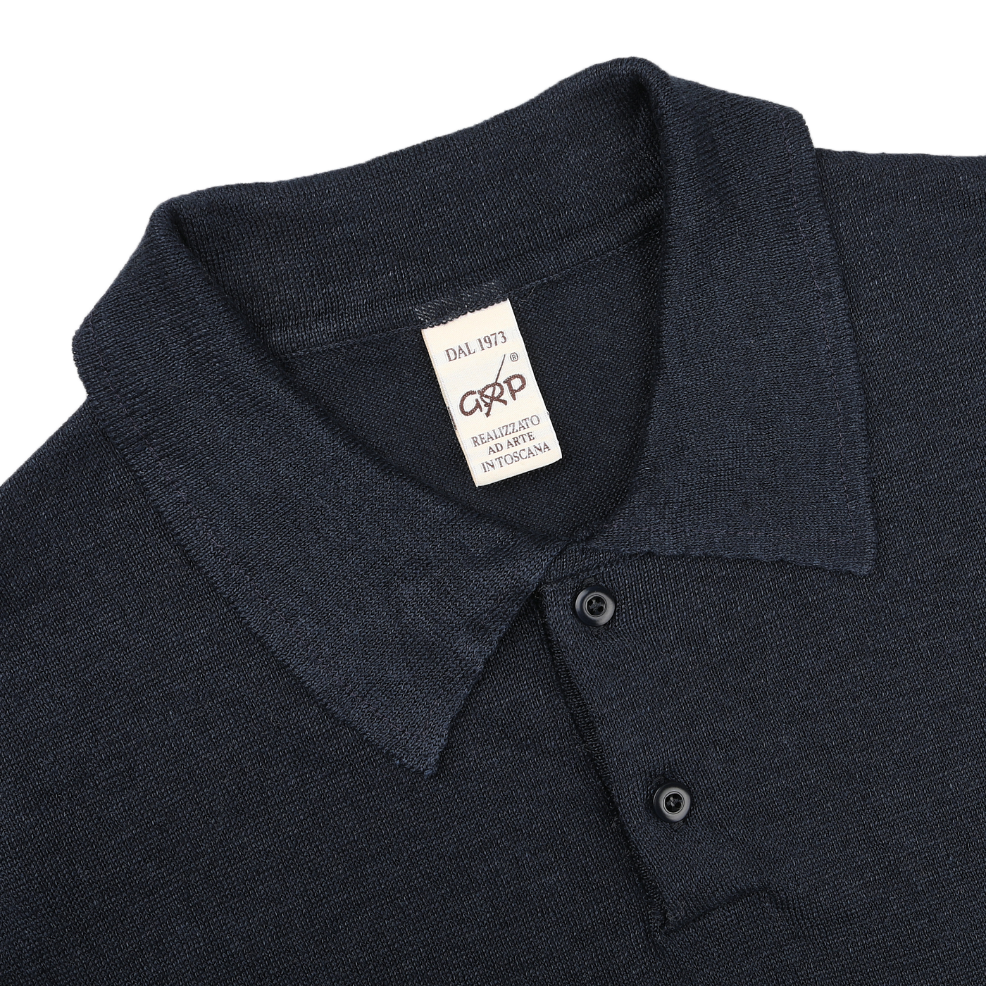 The dark blue slim-fit polo shirt by G.R.P features textured linen fabric, a collar, and three buttons. Label reads "DAL 1973 ASPESI REALIZZATO IN ITALIA.