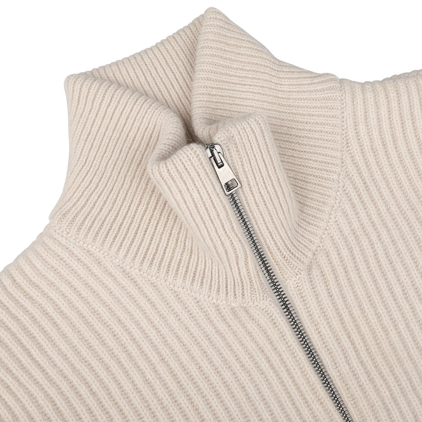 Close-up of the G.R.P Ecru Beige Wool Cashmere Knitted Jacket, a rib-knit sweater featuring a high collar and a metallic zipper running down the middle. Crafted from luxurious wool and cashmere, it's ideal as a stylish seasonal full-zip knitted jacket.