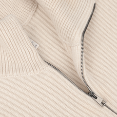 Close-up image of an Ecru Beige Wool Cashmere Knitted Jacket by G.R.P, featuring a ribbed design and a partially unzipped high collar.