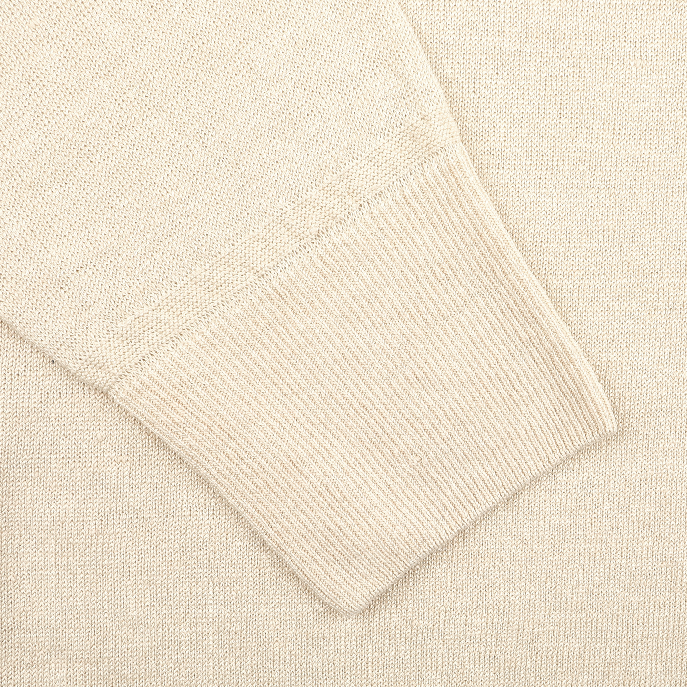 A close-up of the Ecru Beige Linen Crewneck Sweater by G.R.P highlights its ribbed cuff detail and textured fabric. The slim fit adds elegance while offering cozy warmth, making it suitable for any occasion.