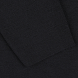 Close-up of two overlapping pieces of textured fabric from the Night Blue Wool Crewneck Sweater by G.R.P.