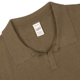 A close up of a G.R.P Olive Green Cotton Linen Polo Shirt.
