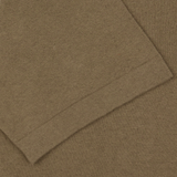 A close up of a Olive Green Cotton Linen polo shirt by G.R.P.