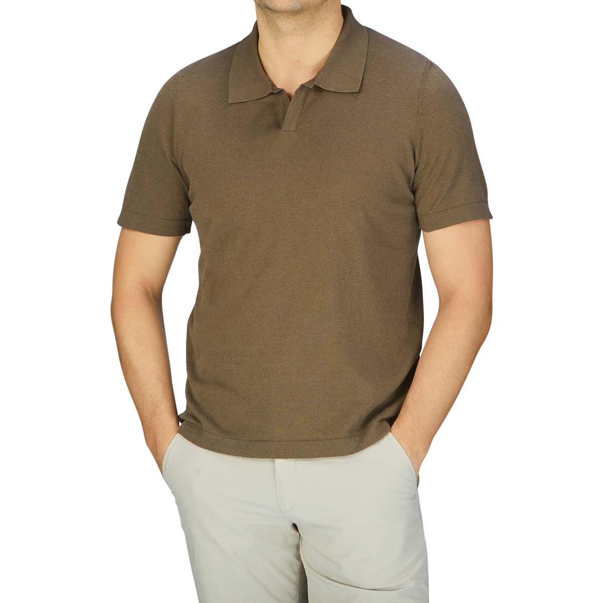 A man wearing a Olive Green Cotton Linen Polo Shirt by G.R.P and khaki pants.