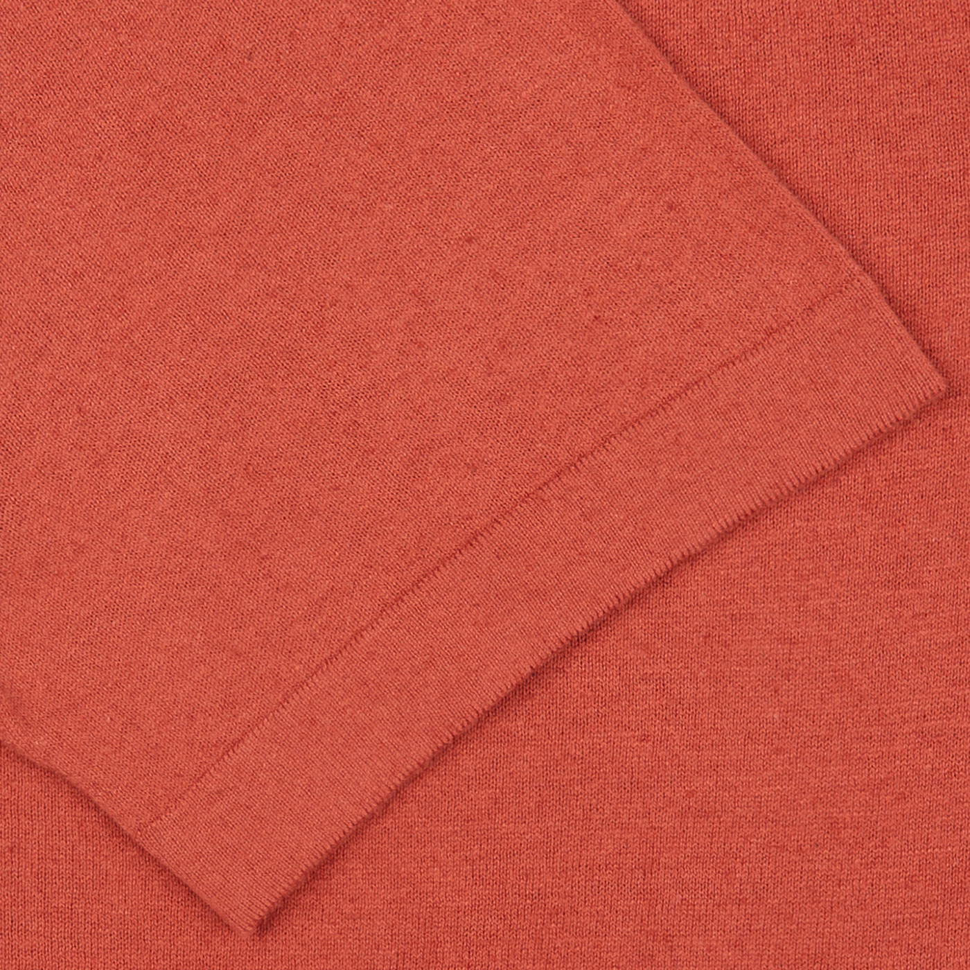 A close up of a Rust Red Cotton Linen Polo Shirt from G.R.P.
