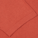 A close up of a Rust Red Cotton Linen Polo Shirt from G.R.P.