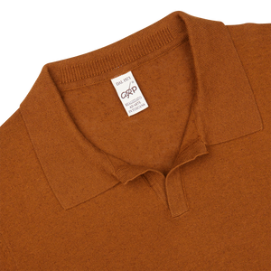 A Tobacco Cotton Linen Polo Shirt by G.R.P with a collar.