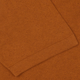 A close up of a G.R.P Tobacco Cotton Linen Polo Shirt.