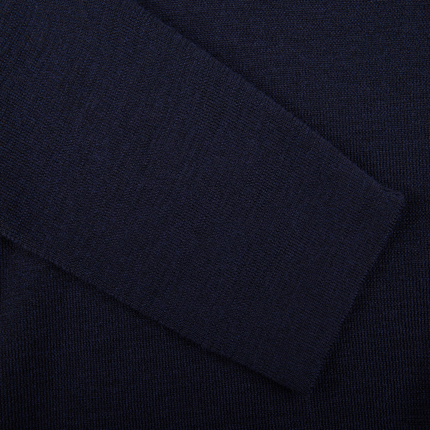 A close up of a Navy Blue Merino Wool Zip Jacket made from pure merino wool by G.R.P.