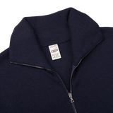 A close up of a G.R.P navy blue zip up sweater made of pure merino wool.