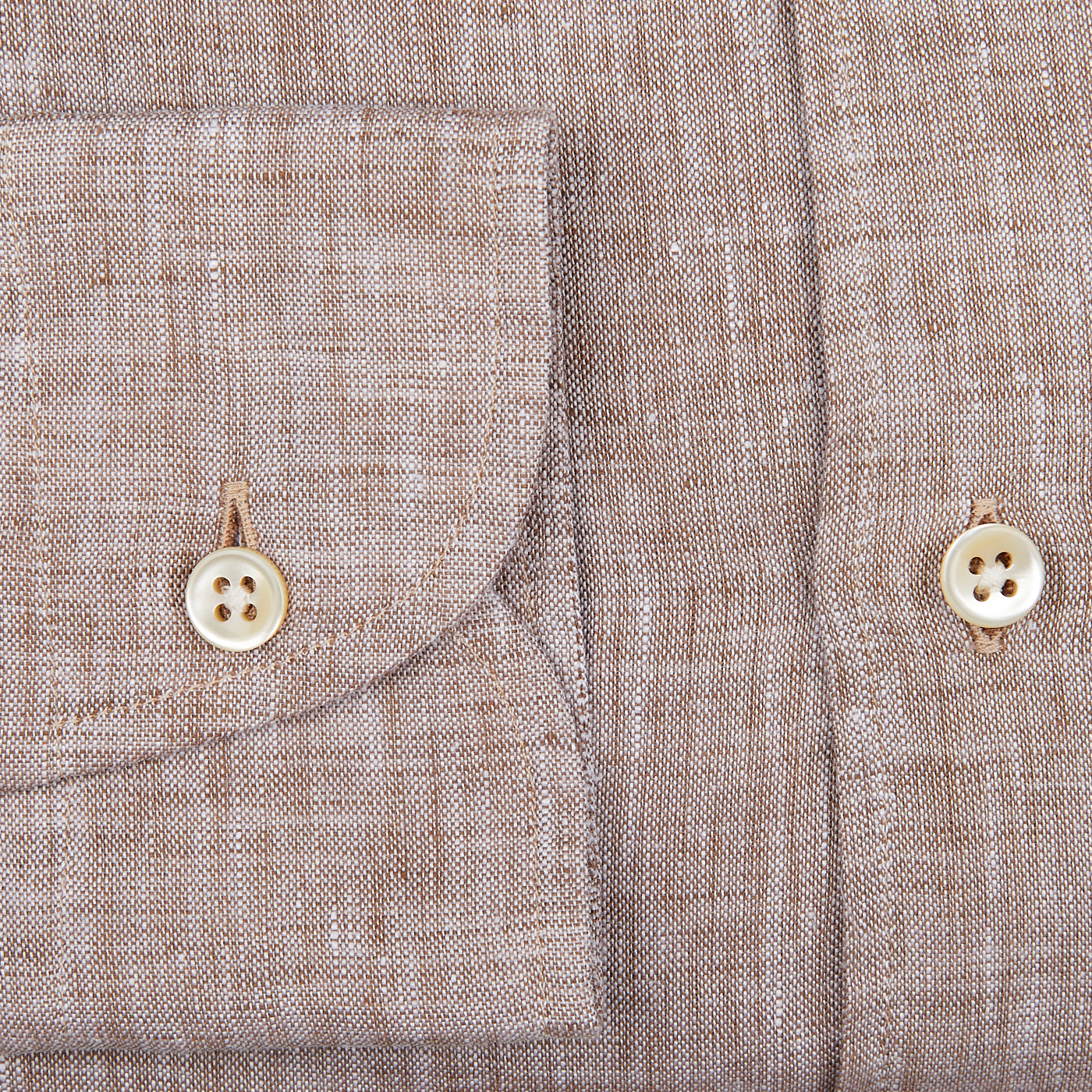 Close-up of a Glanshirt Brown Melange Linen Regular Fit Shirt with two buttons on a garment.