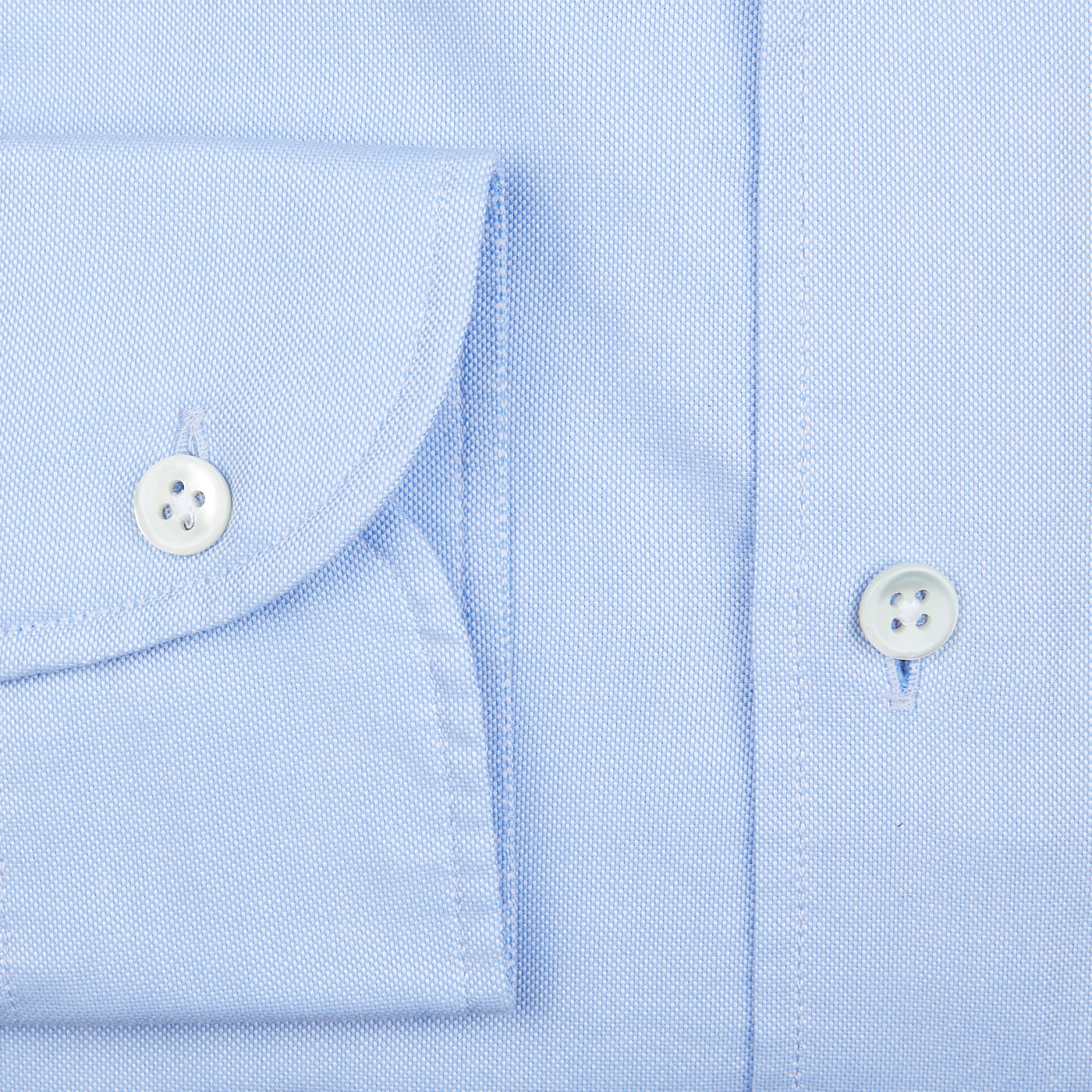 Close-up of a Glanshirt Light Blue Cotton Oxford Regular Shirt with a buttoned sleeve.