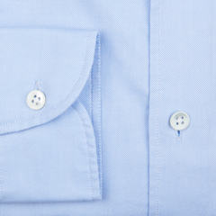 Close-up of a Glanshirt Light Blue Cotton Oxford Regular Shirt with a buttoned sleeve.