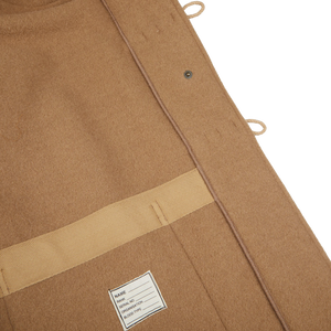 The back of a Camel Wool Monty Duffel Coat crafted from British wool by Gloverall.