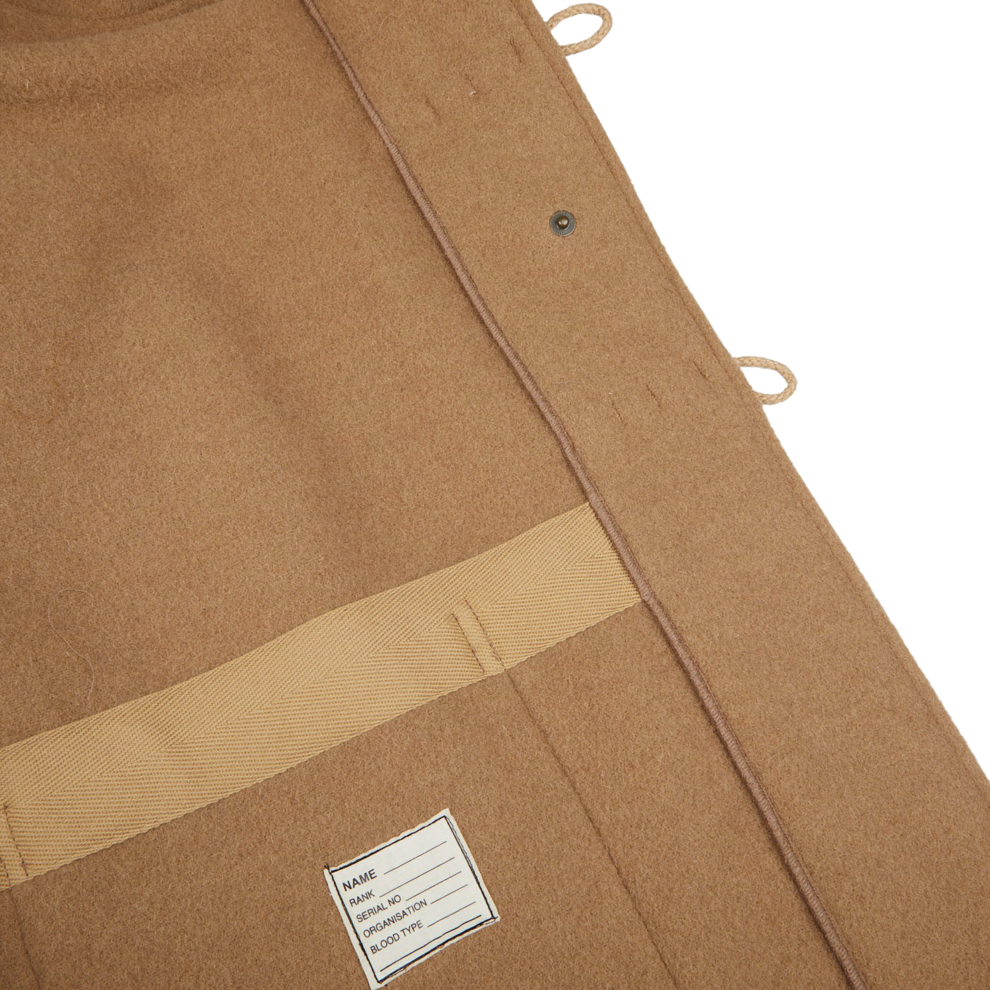The back of a Camel Wool Monty Duffel Coat crafted from British wool by Gloverall.