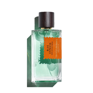 A 100ml Eau de Parfum glass bottle of Blue Cypress by Goldfield & Banks, showcasing a woody base with aromatic spices, topped with a wooden cap and containing a green-tinted liquid inside.