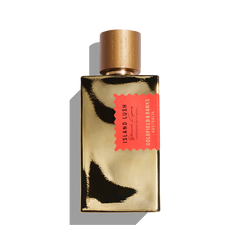 A gold bottle of Goldfield & Banks Island Lush 100ml Eau De Parfum, adorned with a red tag, is set against a white background, embodying the exoticism of contemporary woods and the captivating essence of South Pacific Sandalwood.