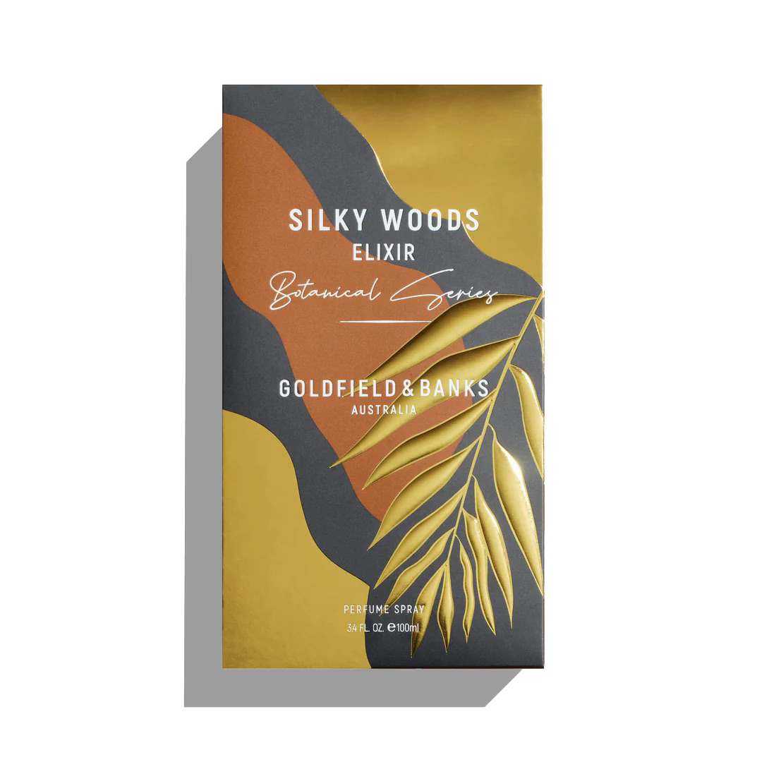 The Goldfield & Banks product, "Silky Woods Elixir 100ml Extrait de Parfum," boasts an exotic botanical leaf design on its packaging, harmoniously complemented by hints of agarwood.