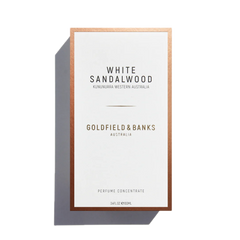 A 100ml bottle of Goldfield & Banks White Sandalwood Eau De Parfum, adorned with the label "Kununurra Western Australia," emanates delicate notes of amber and Turkish rose, encapsulating a sense of luxury and exotic charm.