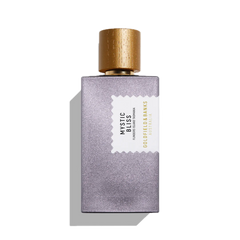 A 100ml bottle of Mystic Bliss Eau De Parfum by Goldfield & Banks, with notes of cedarwood, features a textured purple body and a gold cap, all set gracefully against a white background.