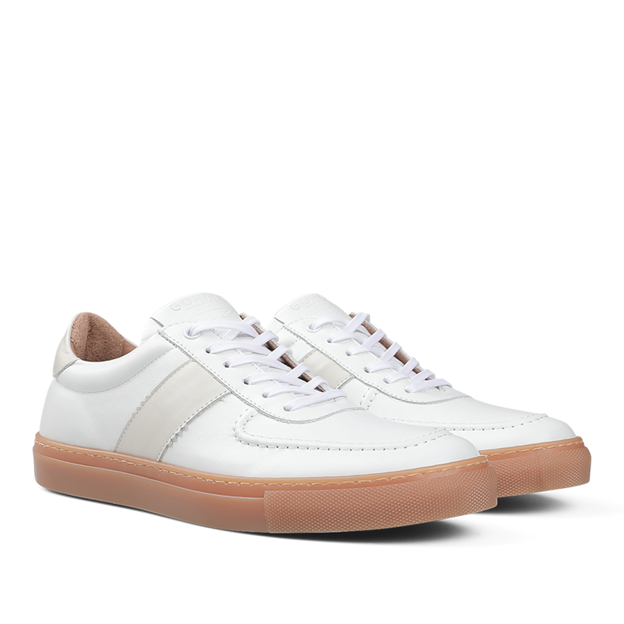 Goral's White Leather Hadfield Sneakers boast a classic German military trainer style, complete with tan rubber soles, white laces, and intricate stitching details.