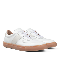 Goral's White Leather Hadfield Sneakers boast a classic German military trainer style, complete with tan rubber soles, white laces, and intricate stitching details.