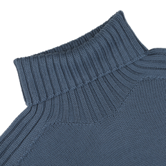 Close-up of a Gran Sasso Airforce Blue Rain Wool Rollneck, showcasing its ribbed high neck collar and detailed stitching and texture.