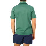 The back view of a man wearing an Aqua Green Cotton Filo Scozia Gran Sasso polo shirt.
