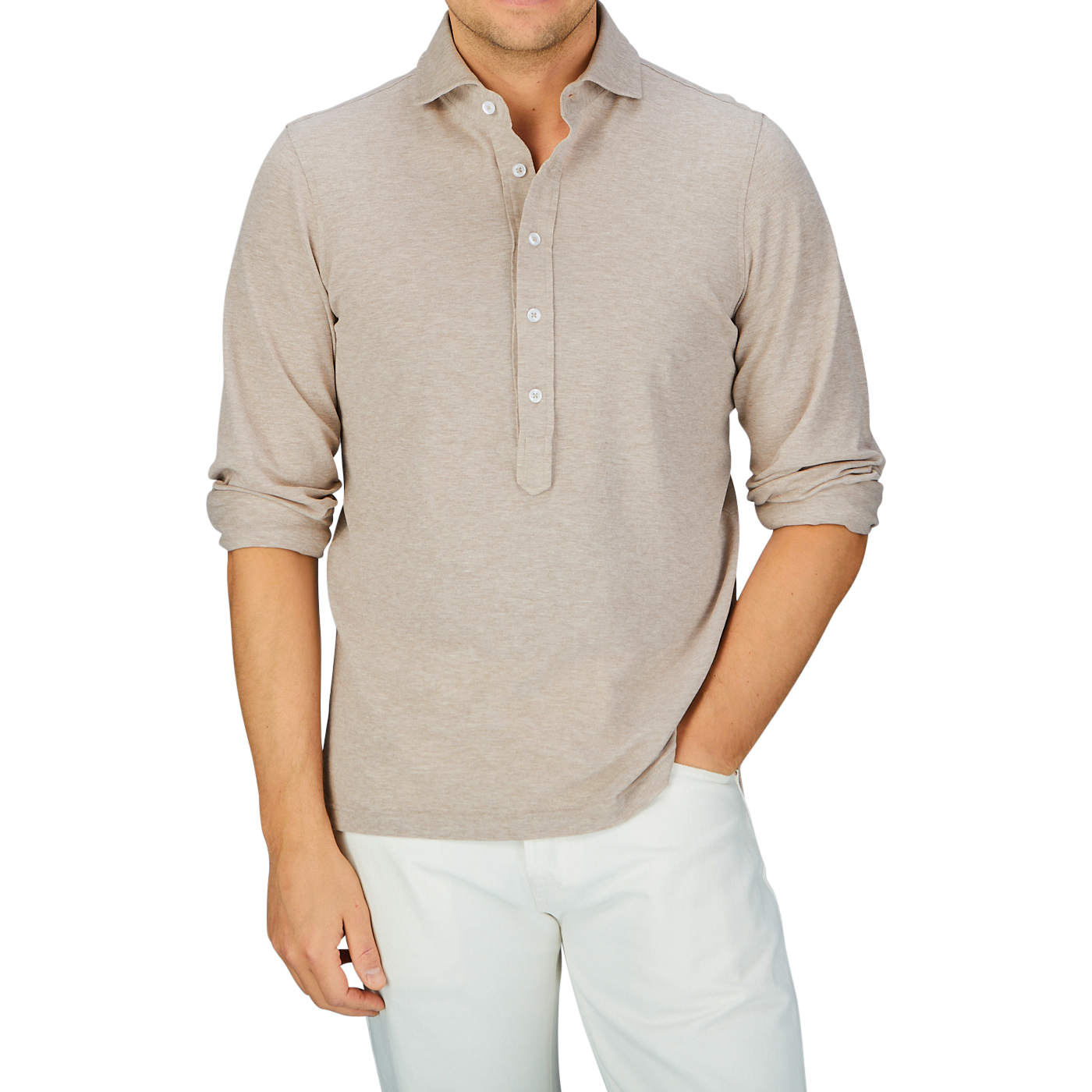 Man in a slim fit, Gran Sasso beige long-sleeve cotton jersey popover shirt and white pants.