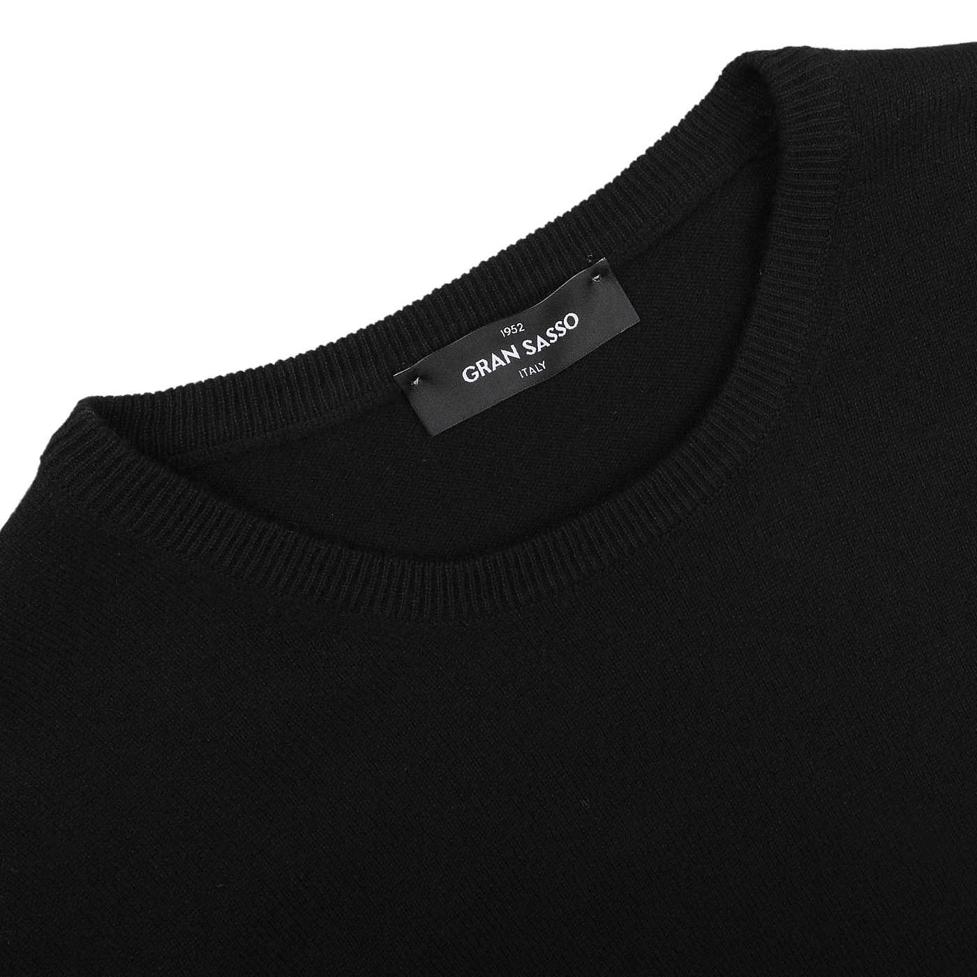 Indulge in the luxury of pure cashmere with the Black Cashmere Crewneck Sweater by Gran Sasso, where the brand label is elegantly displayed at the neckline. This sophisticated piece embodies sustainable knitwear, merging style with responsibility.