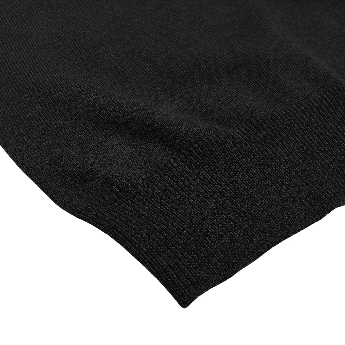 Close-up of a Black Extra Fine Merino Crew Neck from Gran Sasso, featuring a ribbed hem, against a white background.