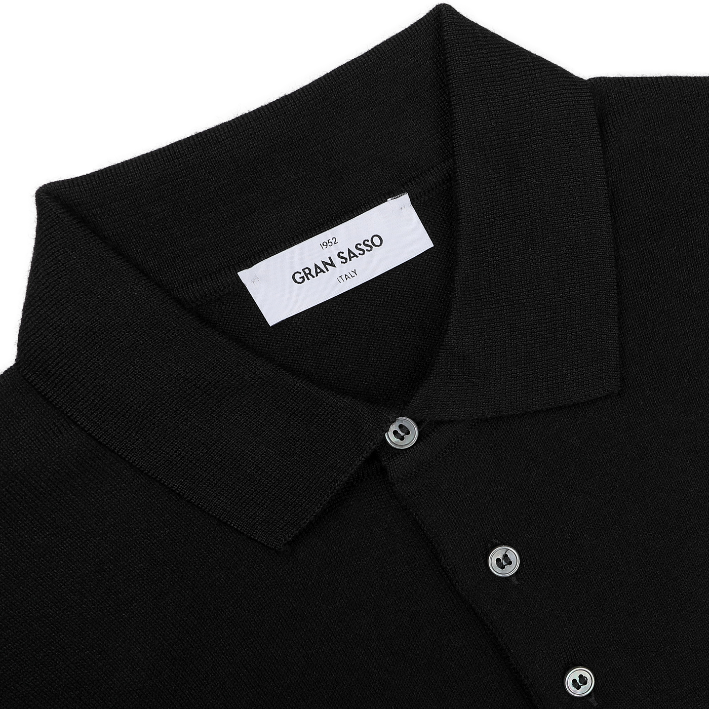 Gran Sasso's Black Extra Fine Merino Wool Polo Shirt showcases a folded collar and button-up front, with the brand’s label elegantly placed inside the collar.