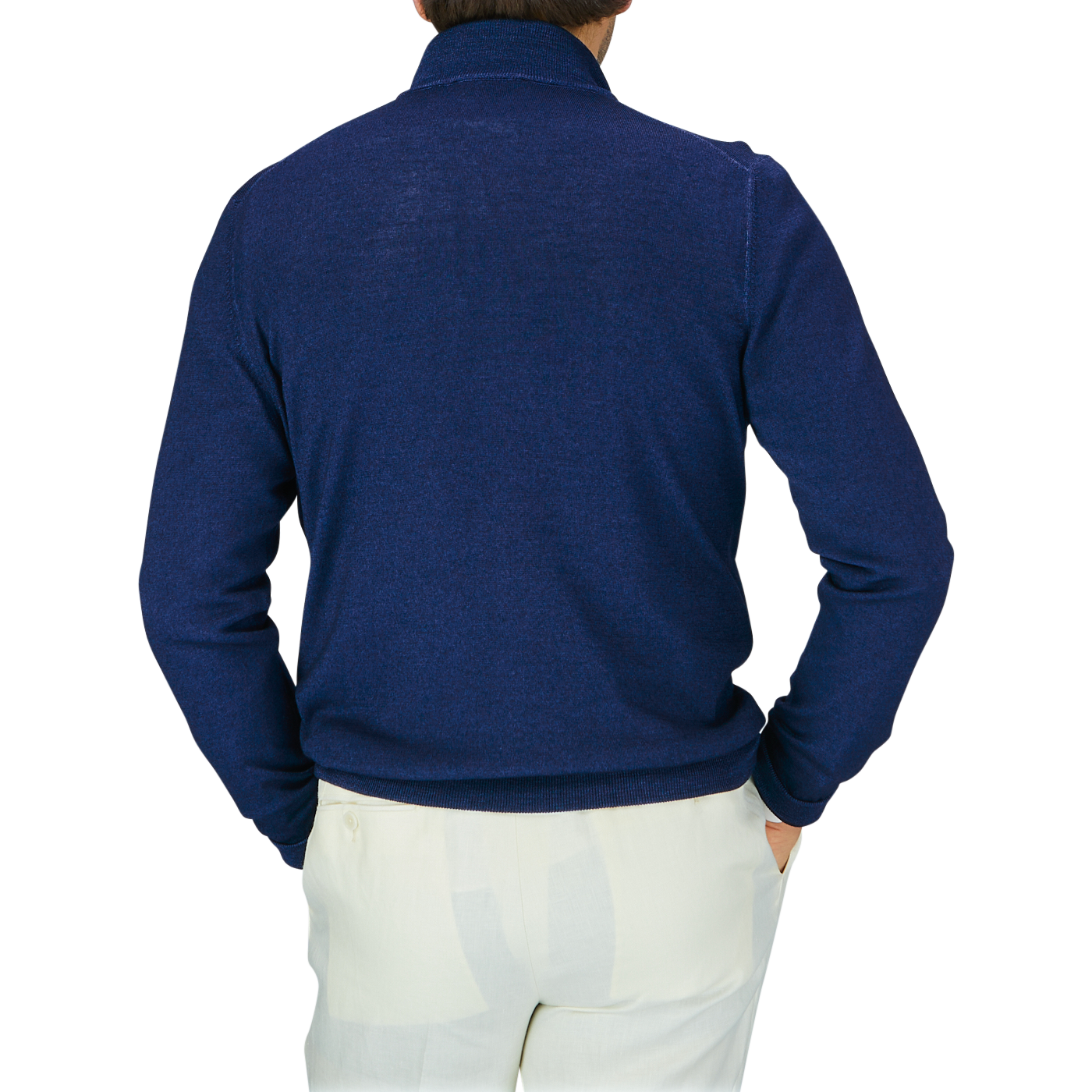 Man facing away from the camera wearing a Gran Sasso Blue Melange Vintage Merino Wool Zip Cardigan with a vintage feel and light-colored pants.