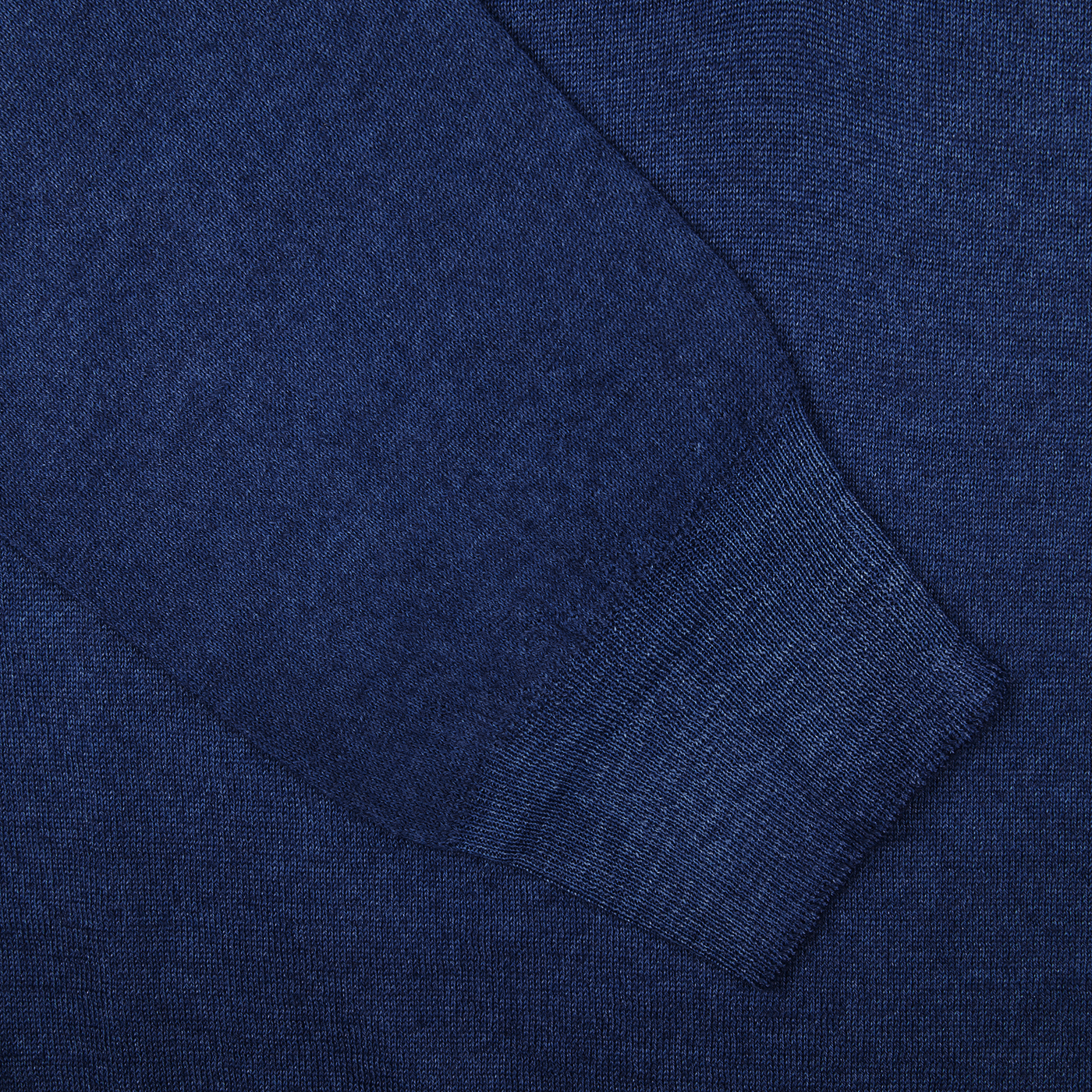 Close-up of Gran Sasso Blue Melange Vintage Merino Wool Zip Cardigan fabric texture with visible weave pattern, offering a vintage feel.