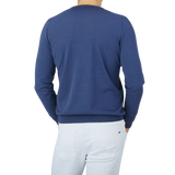 The back view of a man wearing a Gran Sasso Dark Blue Silk Cotton Crewneck Sweater.