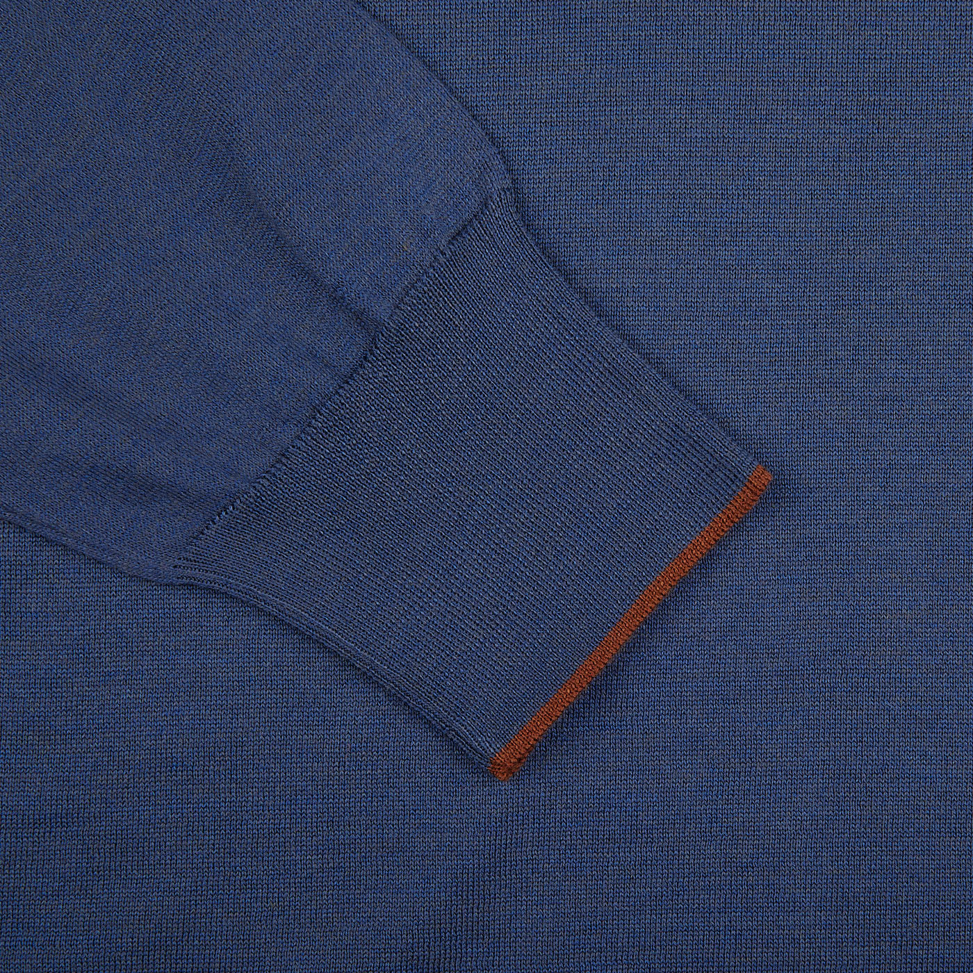 A close up of a Gran Sasso Dark Blue Silk Cotton Crewneck Sweater with orange trim.