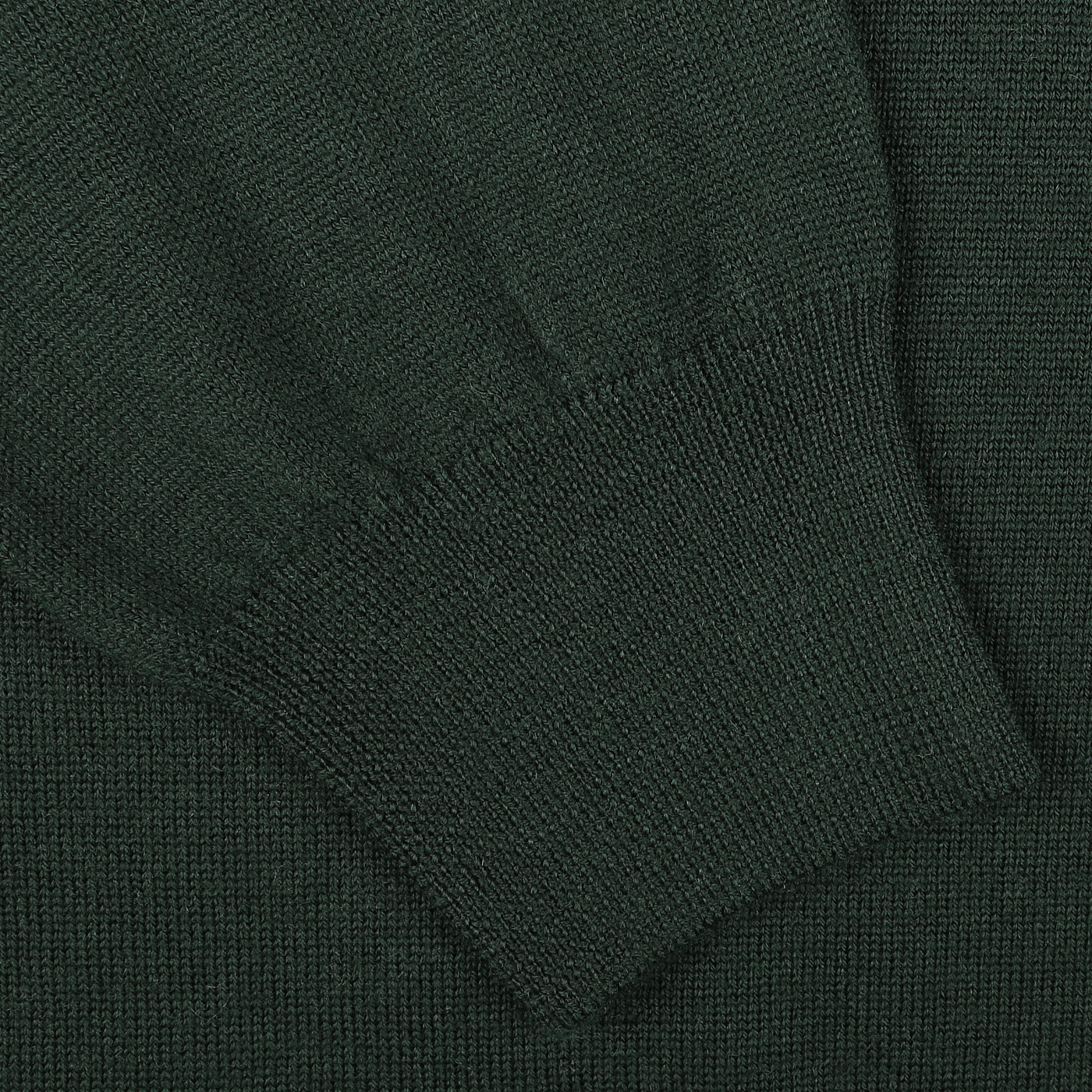 Close-up of the Bottle Green Extrafine Merino Wool Zip Cardigan by Gran Sasso, highlighting its soft merino wool texture and ribbed cuffs.