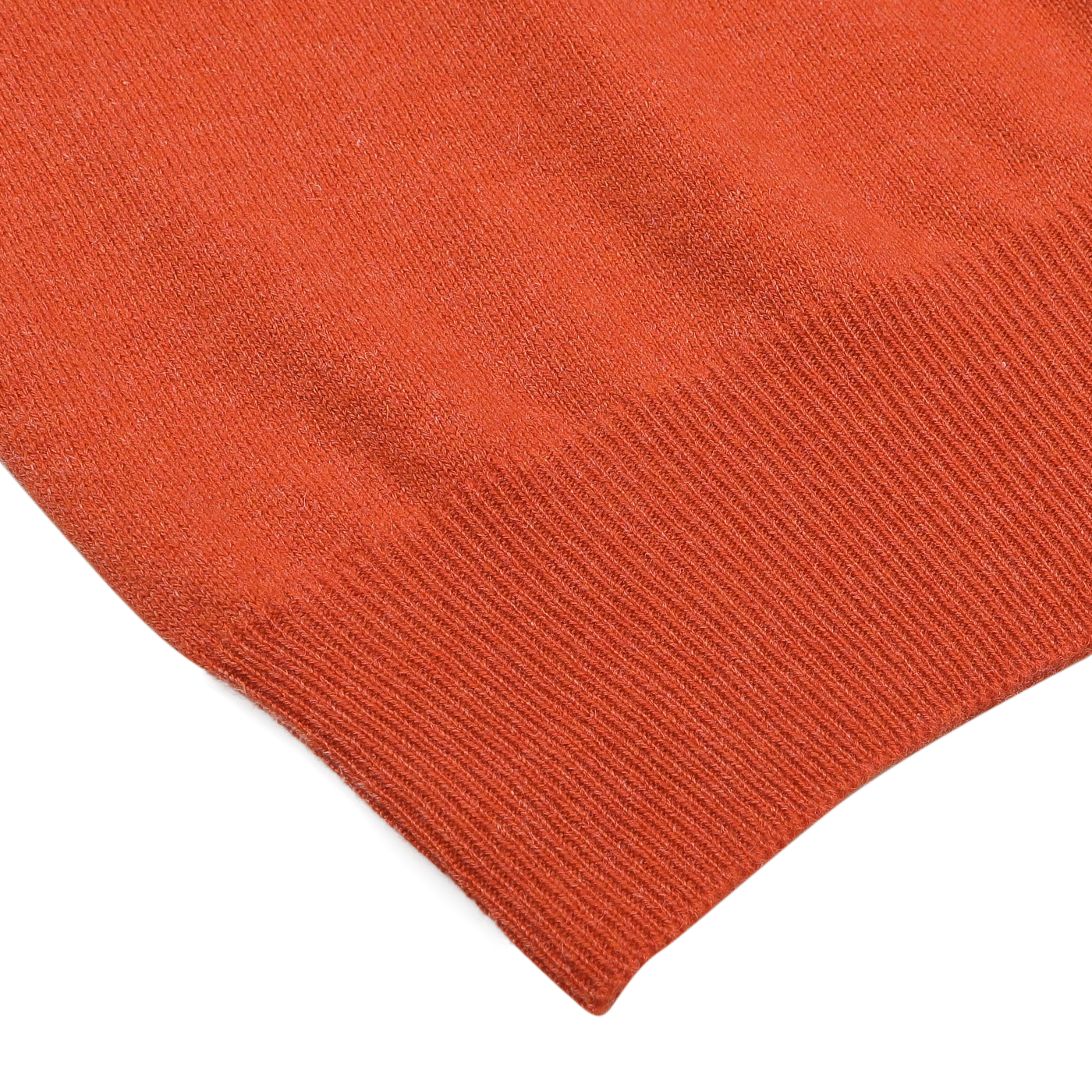 Close-up of the Bright Orange Cashmere 1/4 Zip Sweater by Gran Sasso on a plain background, highlighting the textured fabric and ribbed hem, exemplifying premium knitwear.