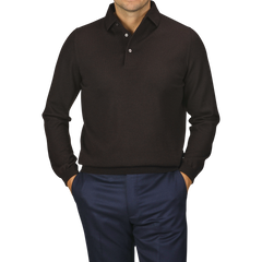 A person with hands in pockets is wearing a Gran Sasso Brown Merino Wool One-Piece Collar Polo Shirt and dark blue pants; the face is not visible.