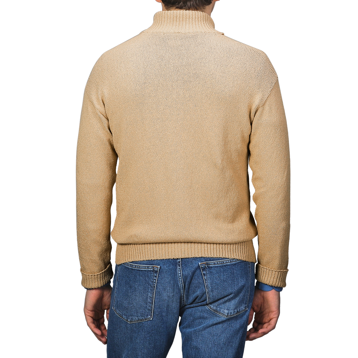 A man in a Gran Sasso Camel Beige Cotton Boucle Full Zip Cardigan and blue jeans stands with his back to us, exuding classic style.