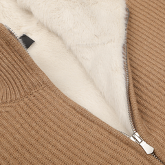 Close-up of the Gran Sasso luxurious Camel Beige Cashmere Blouson featuring a silver zipper and revealing its soft faux fur lining inside.