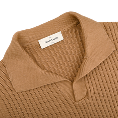 The Camel Brown Organic Cotton Polo Shirt by Gran Sasso is a slim fit, ribbed design featuring a folded collar and the brand label at the neckline.