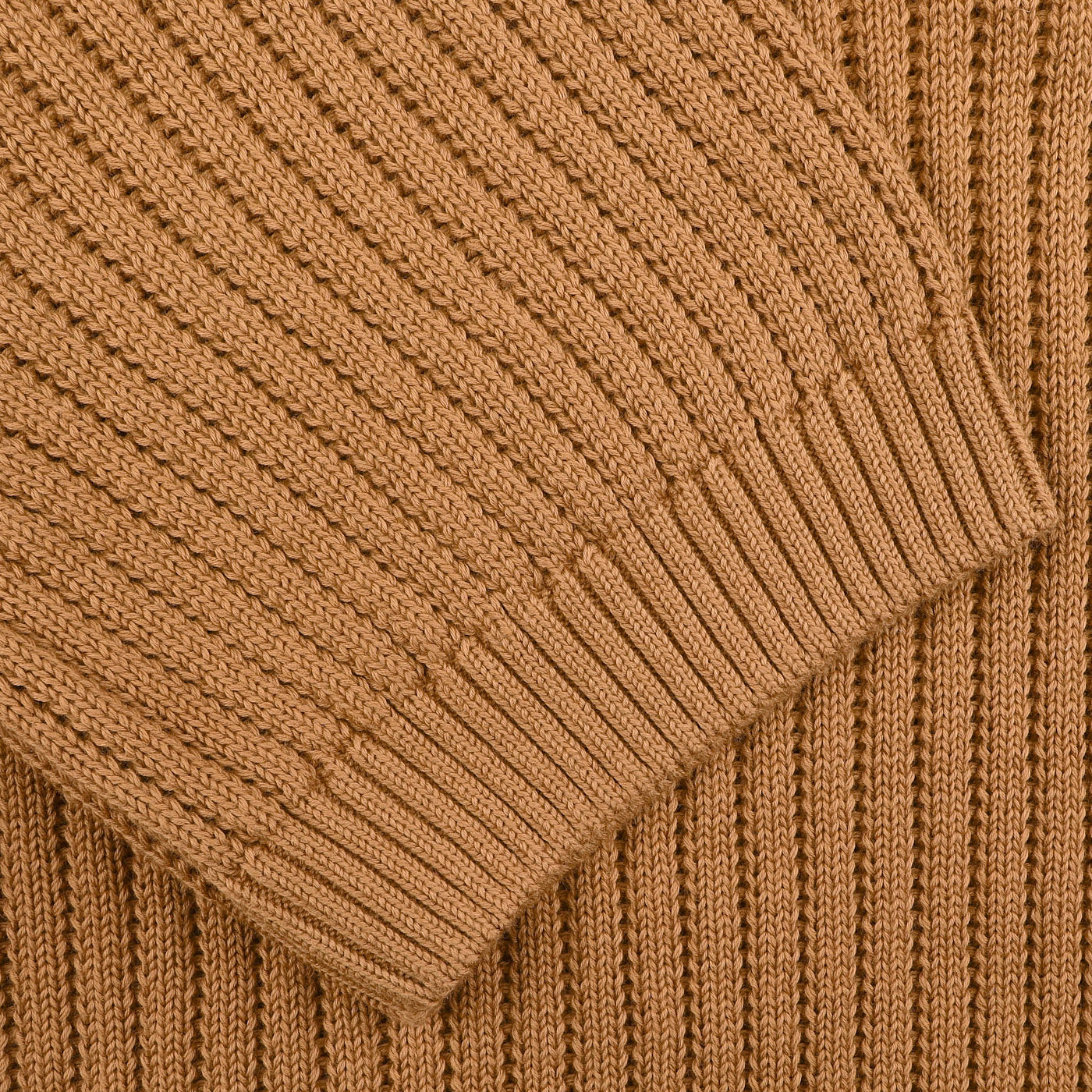 Close-up of the Gran Sasso Camel Brown Organic Cotton Polo Shirt, highlighting its texture and sleeve details.