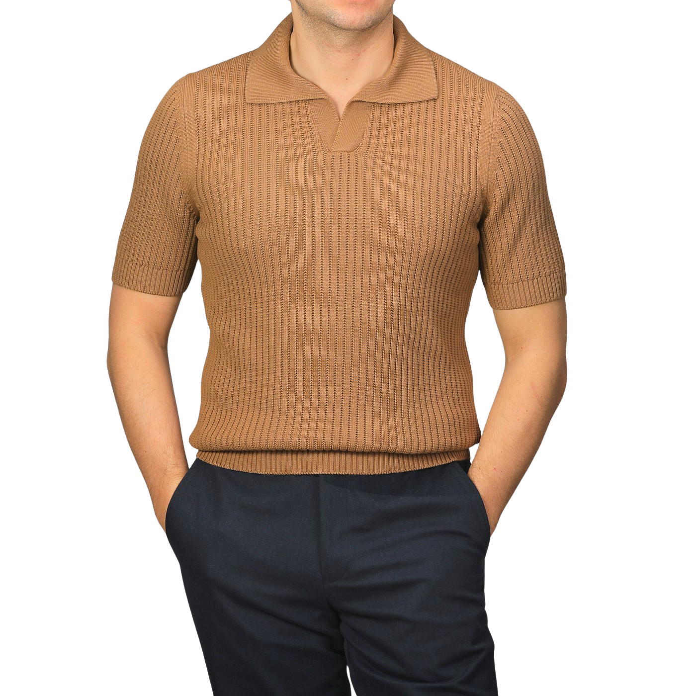 A person wearing a slim-fit Camel Brown Organic Cotton Polo Shirt by Gran Sasso and dark pants stands with hands in pockets against a plain background.