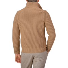 A person wearing a Gran Sasso Camel Wool Cashmere Heavy Knit Cardigan in camel beige with a high collar and matching pants is shown from the back against a plain gray background.