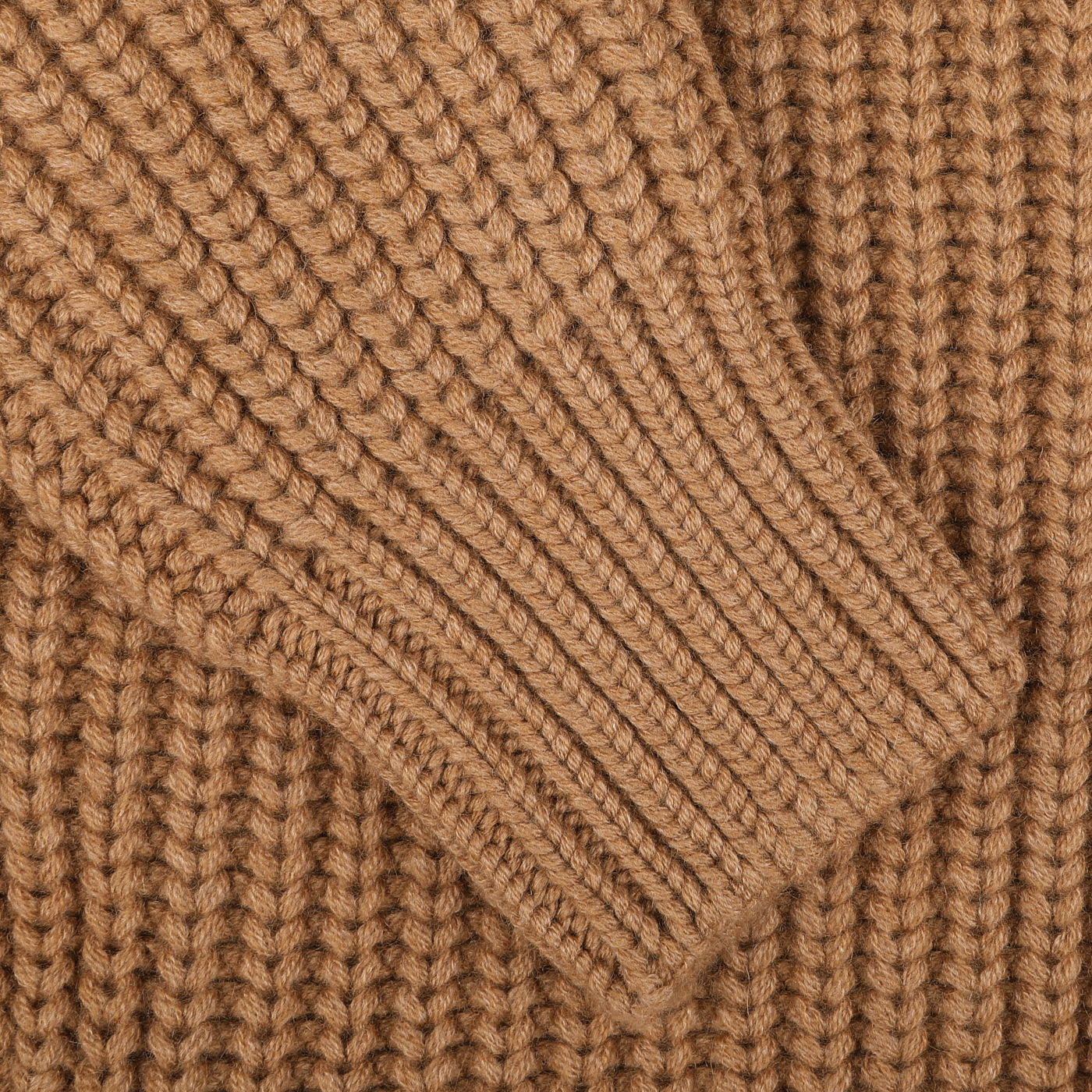 Close-up of a folded Gran Sasso Camel Wool Cashmere Heavy Knit Cardigan in camel beige, featuring a ribbed texture and a full-zip design.