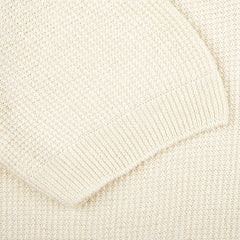 A close up image of a Cream Beige Cotton Linen Polo Shirt made with Gran Sasso thread.