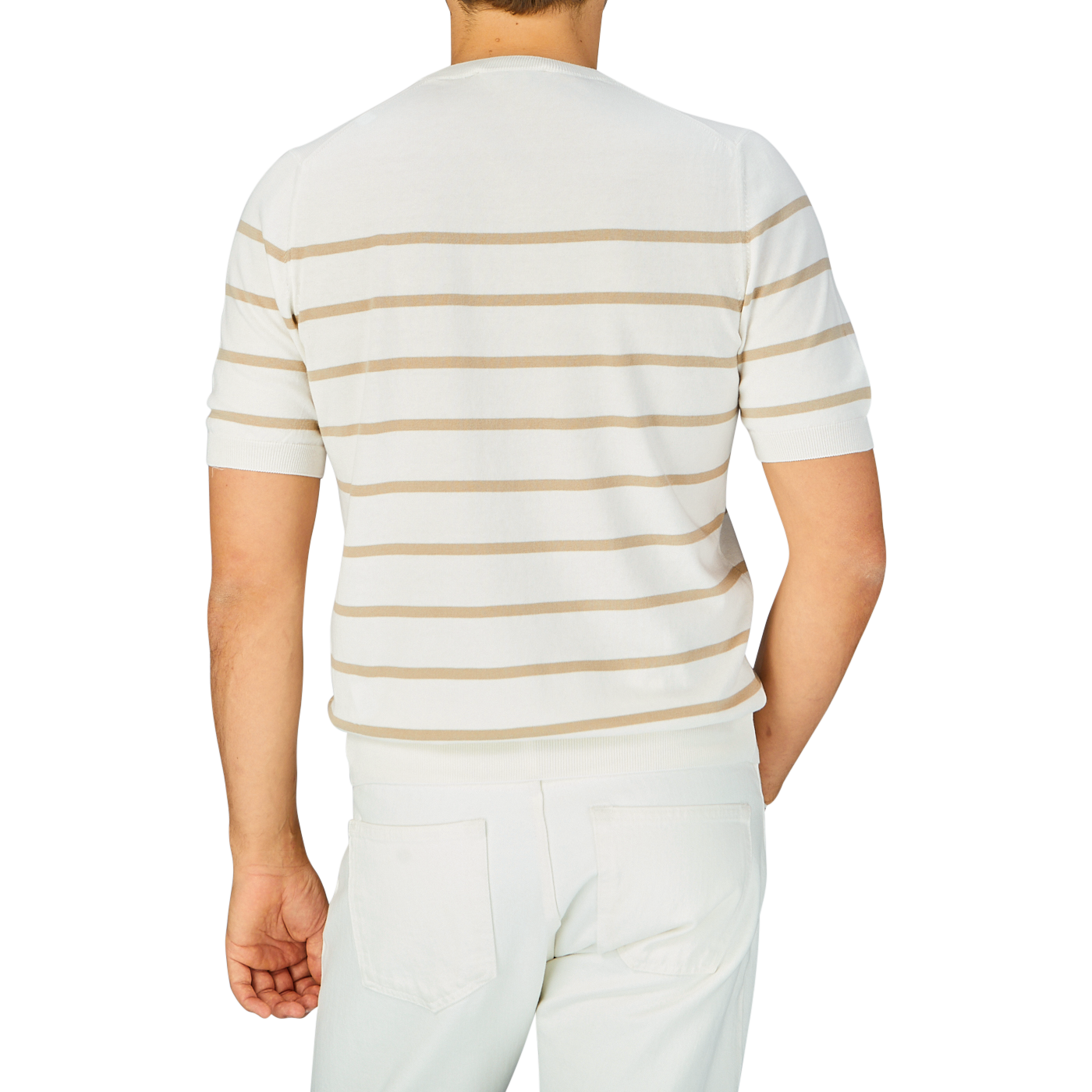 Man standing with his back to the camera wearing a Gran Sasso Cream Beige Striped Organic Cotton T-Shirt and white pants.